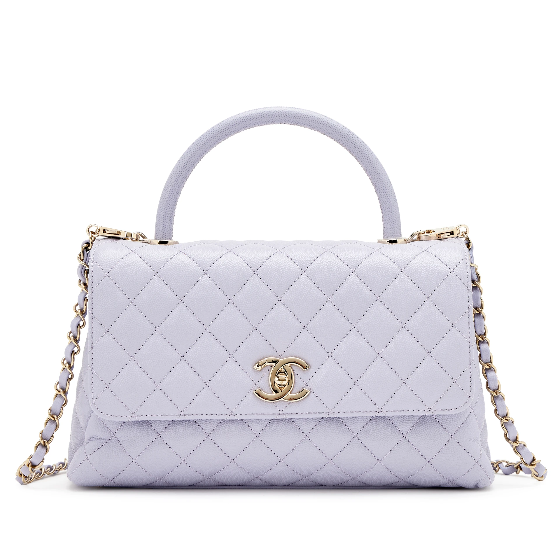 Сумка Chanel Coco Handle Medium на студийной фотографии